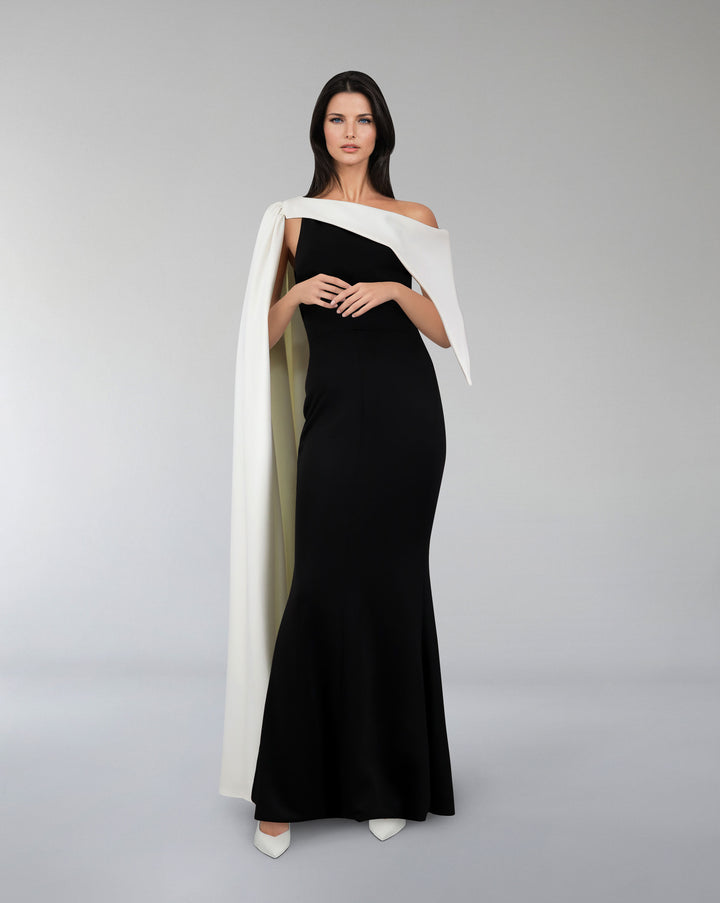 Bicolour column dress with asymmetrical neckline and side cape