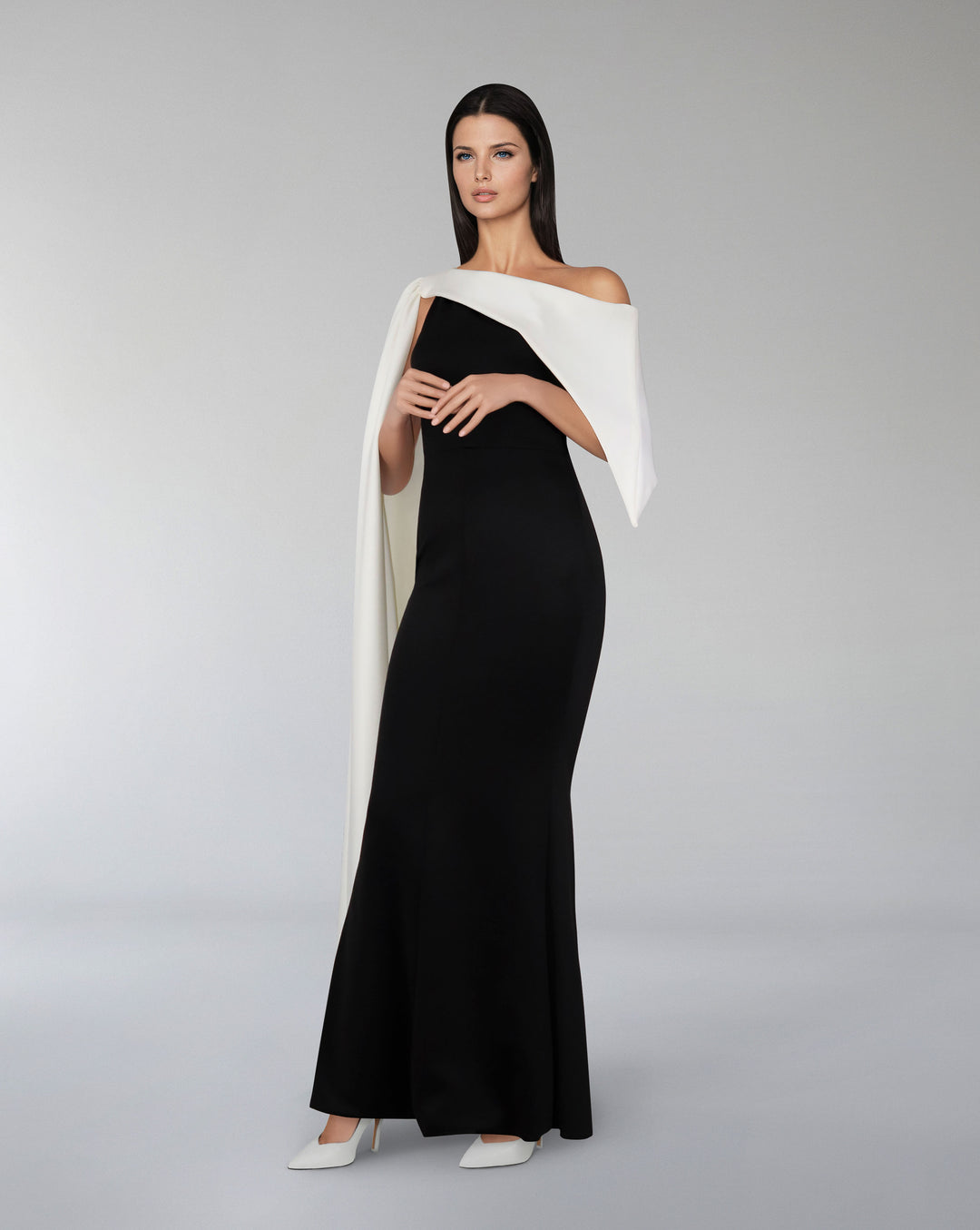 Bicolour column dress with asymmetrical neckline and side cape