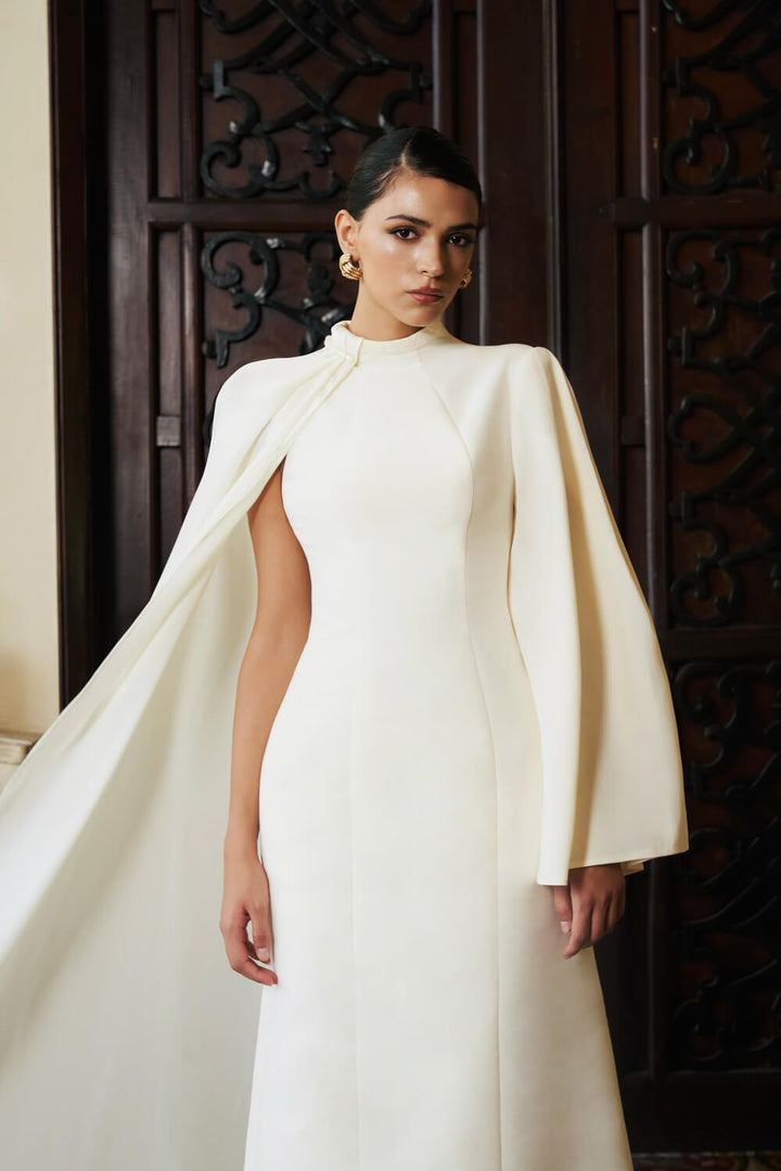 high-neck column gown with draped cape sleeve – ESME