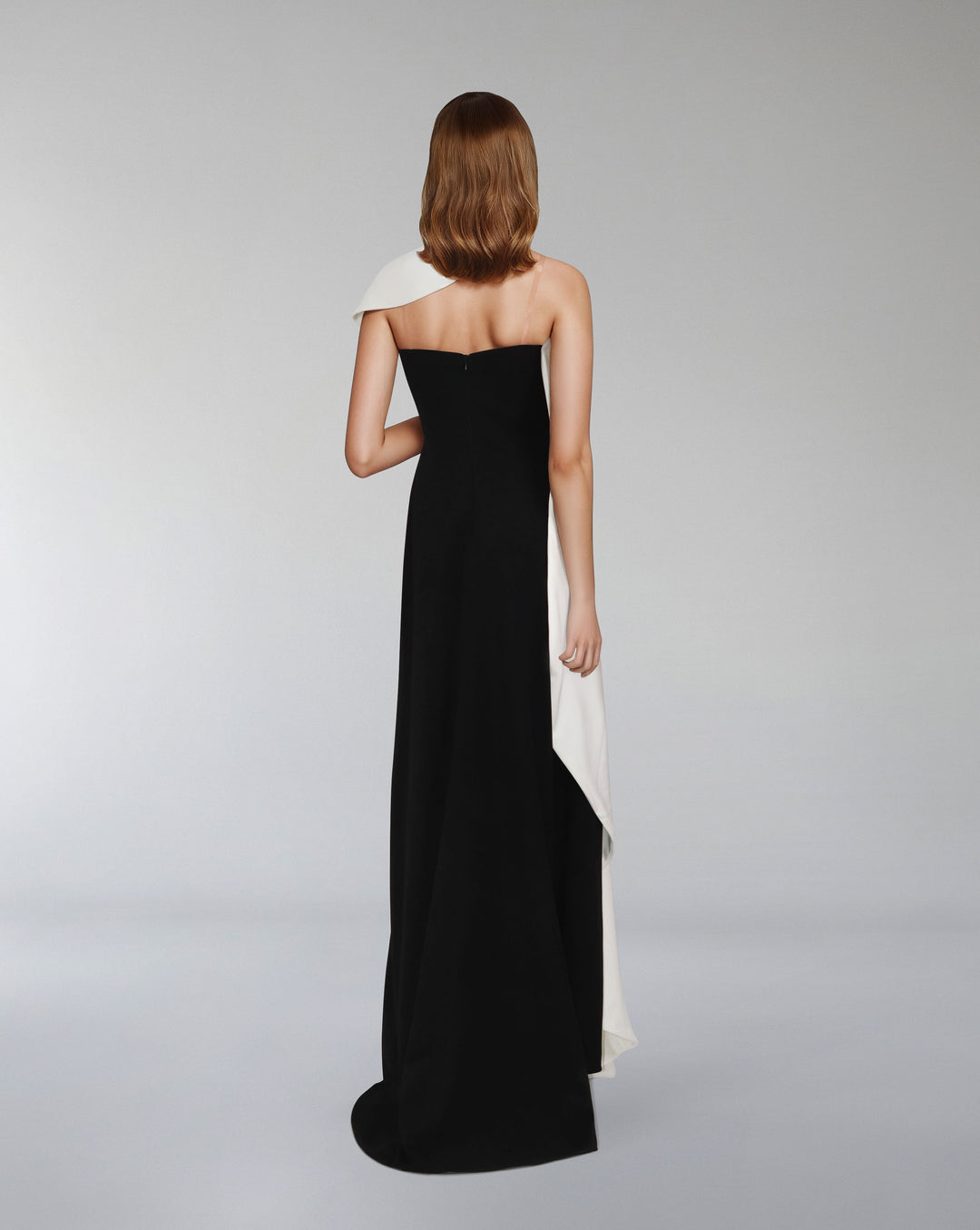 Pleated column dress with asymmetrical cape