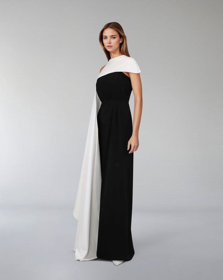 Pleated column dress with asymmetrical cape