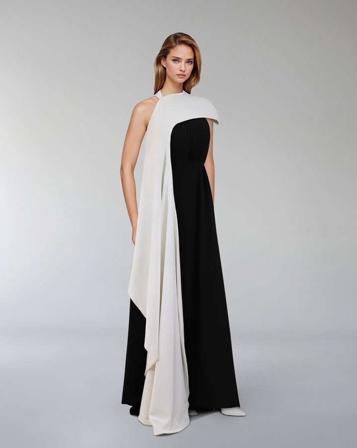 Pleated column dress with asymmetrical cape