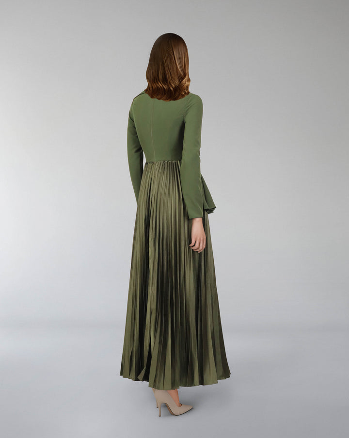 Asymmetrical pleated dress with waistband ruffle