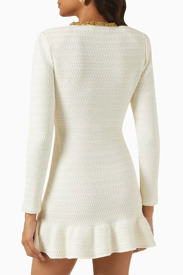 فستان قصير محبوك بأكمام طويلة وحواف ذهبية – فينيوني
