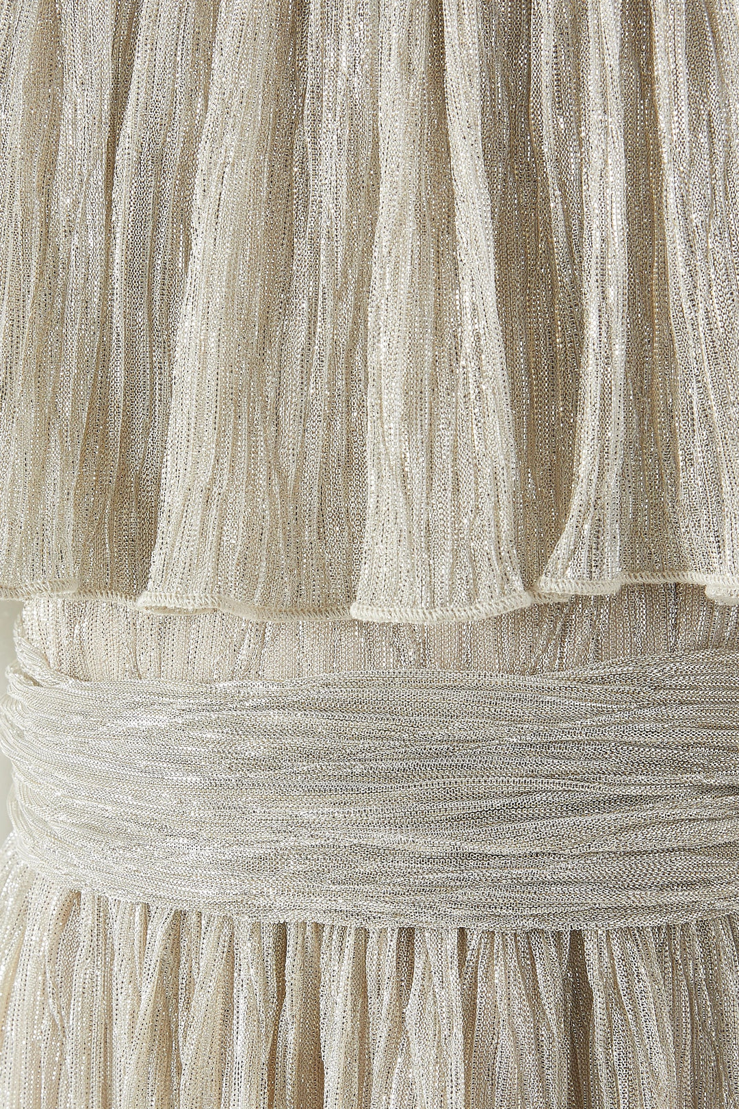 Shimmer Pleated Maxi Dress with Ruffled Overlay & Floral Accent – GLINT