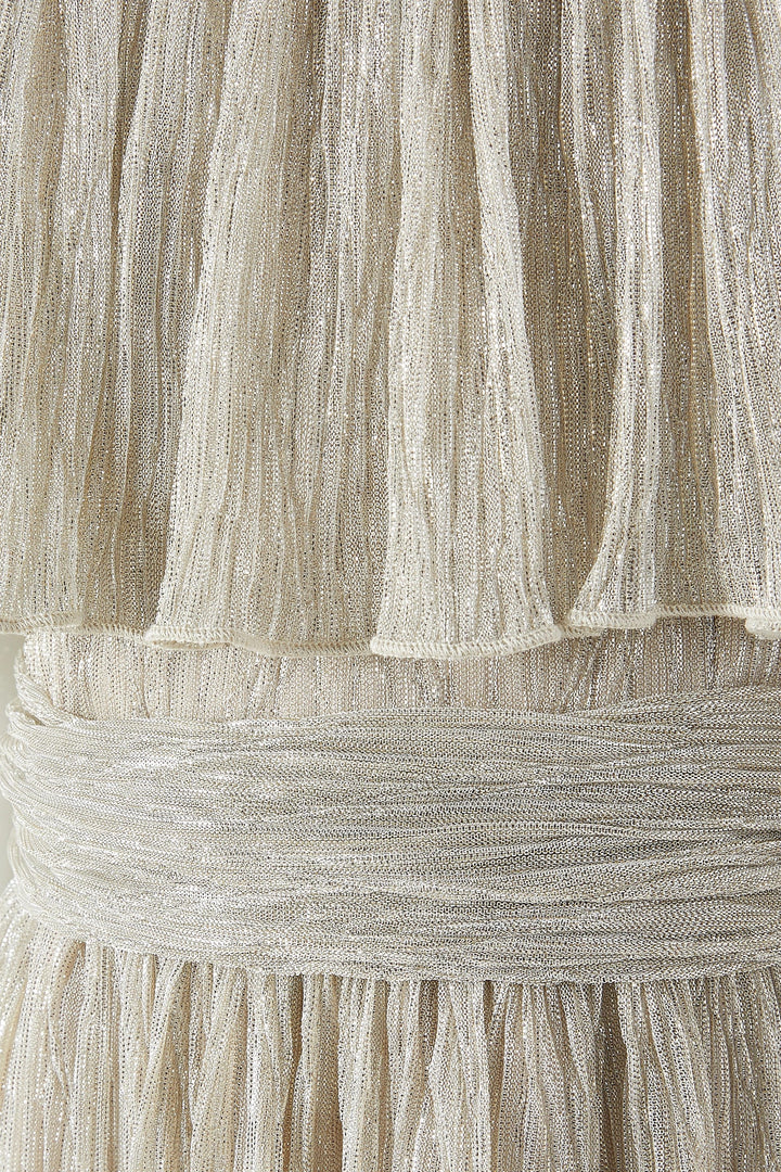 Shimmer Pleated Maxi Dress with Ruffled Overlay & Floral Accent – GLINT