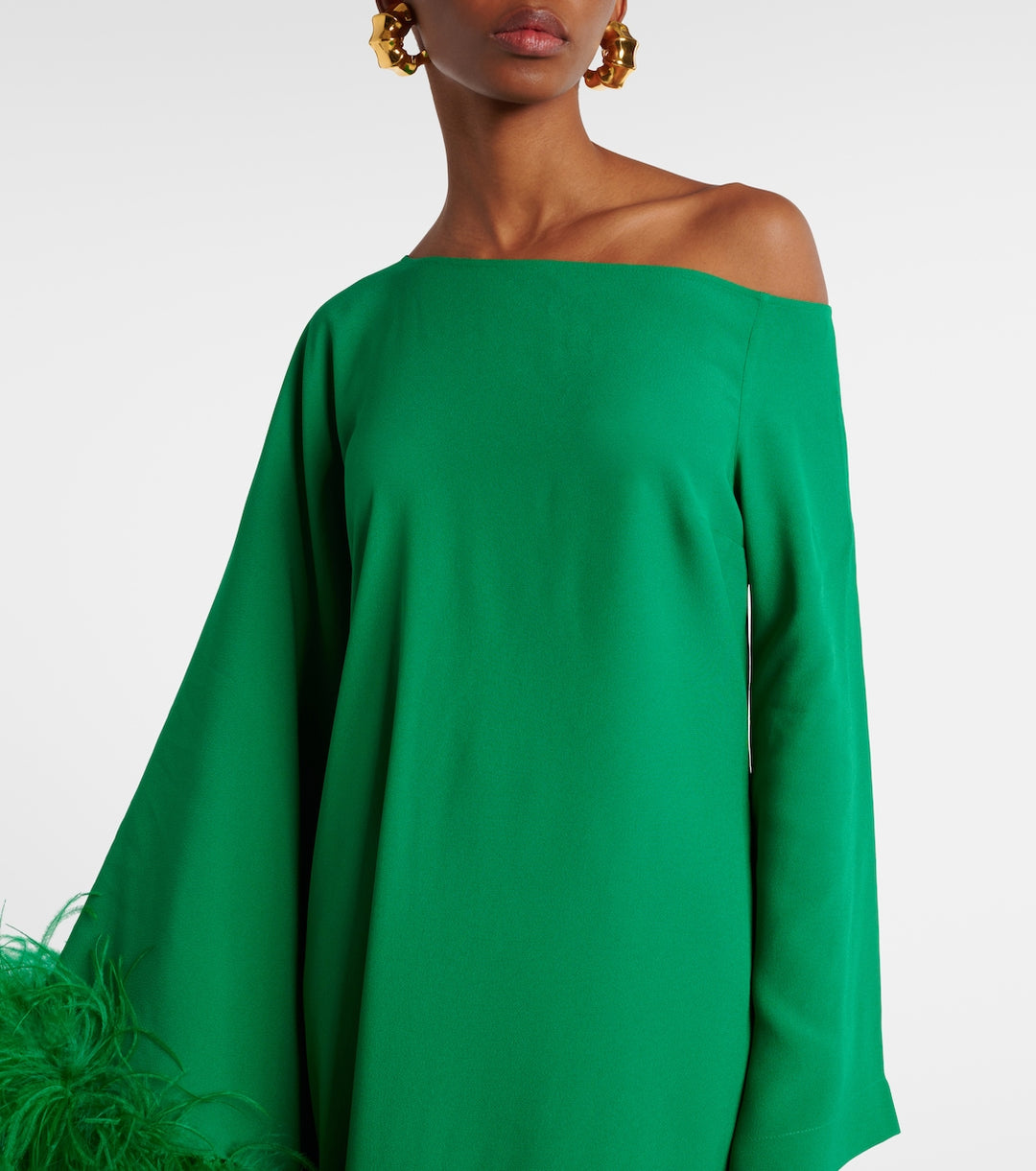 asymmetric gown with feather trim – VIVID