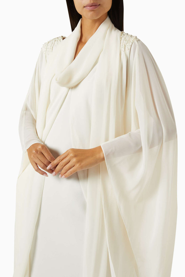 فستان منفوش مع أكتاف مزينة – عاجي