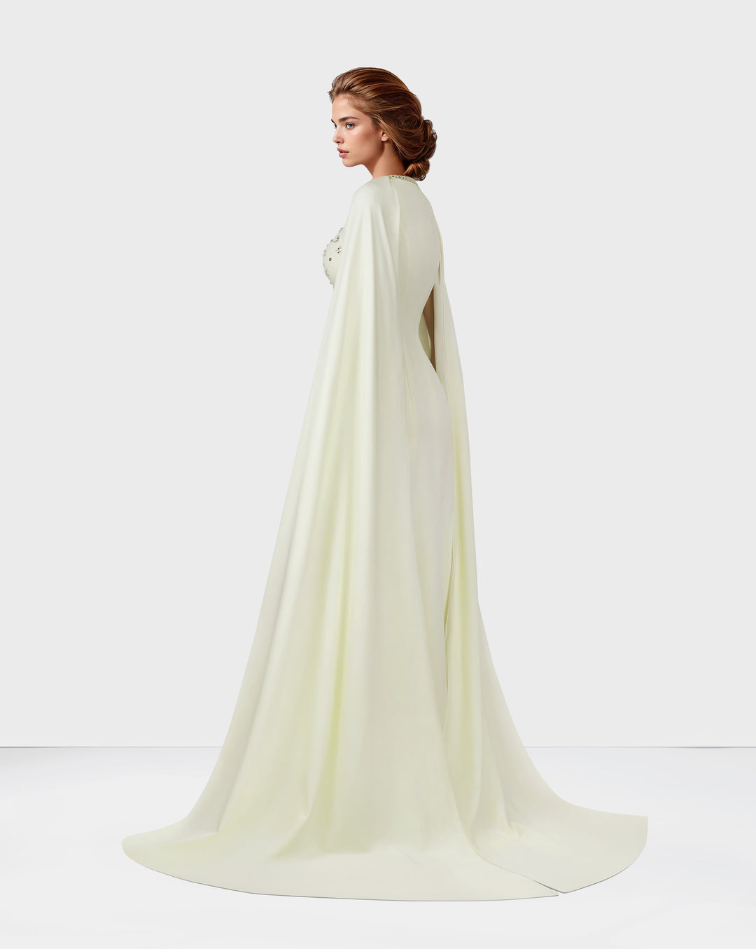Beaded ivory dress with floor-length cape sleeves