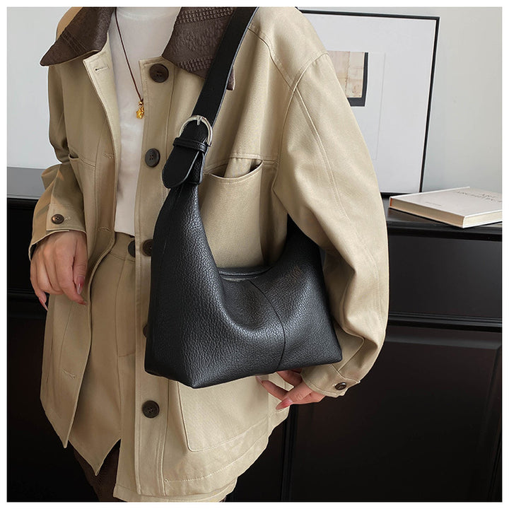 gewebte Rattan-Tragetasche mit doppelten Ledergriffen – LÉONIE 