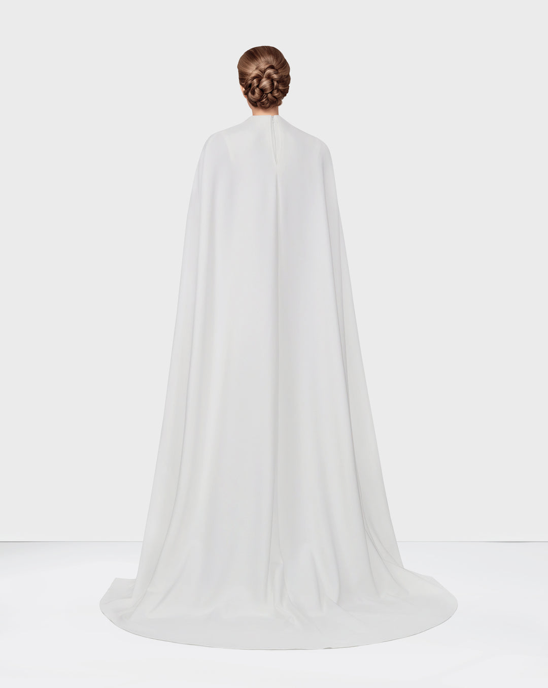 White belted dress with neckline and cape