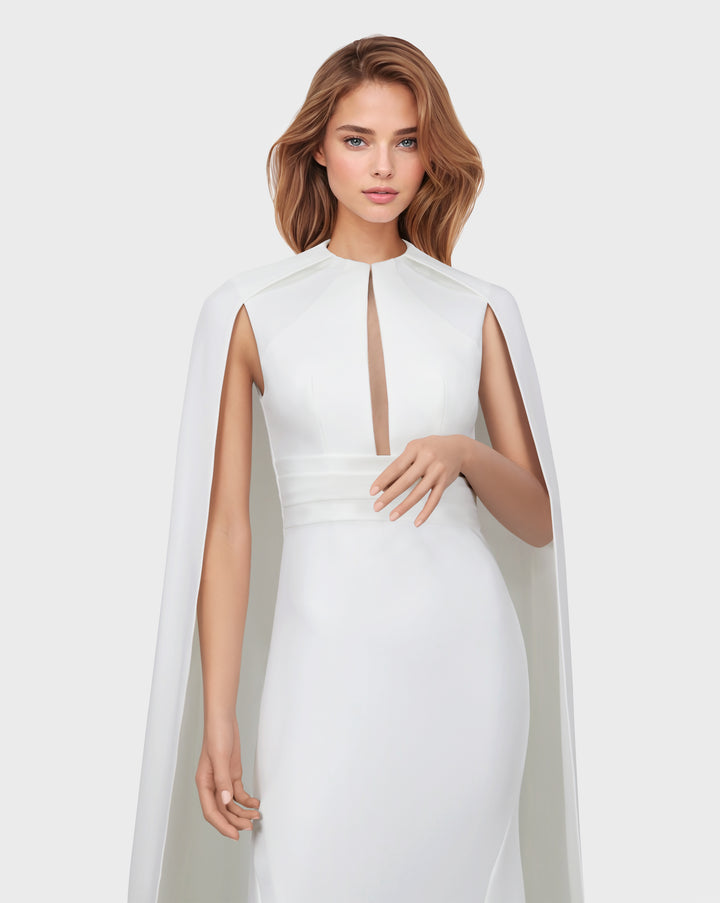 White belted dress with neckline and cape
