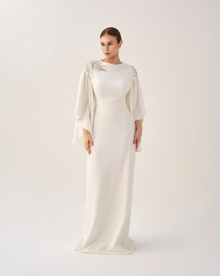 White column dress with ruffled sleeves and sequined shoulders