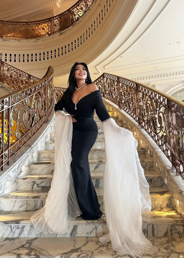 off-shoulder mermaid gown with dramatic pleated sleeves – Sherrey