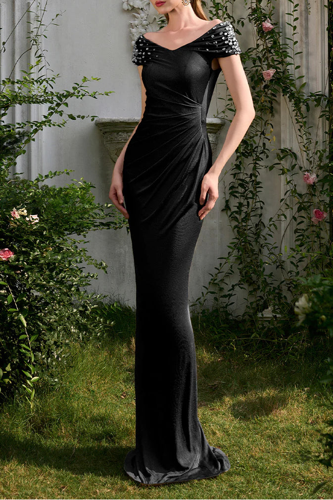 فستان مخملي مكشوف الكتفين بأكمام مزينة – نوار