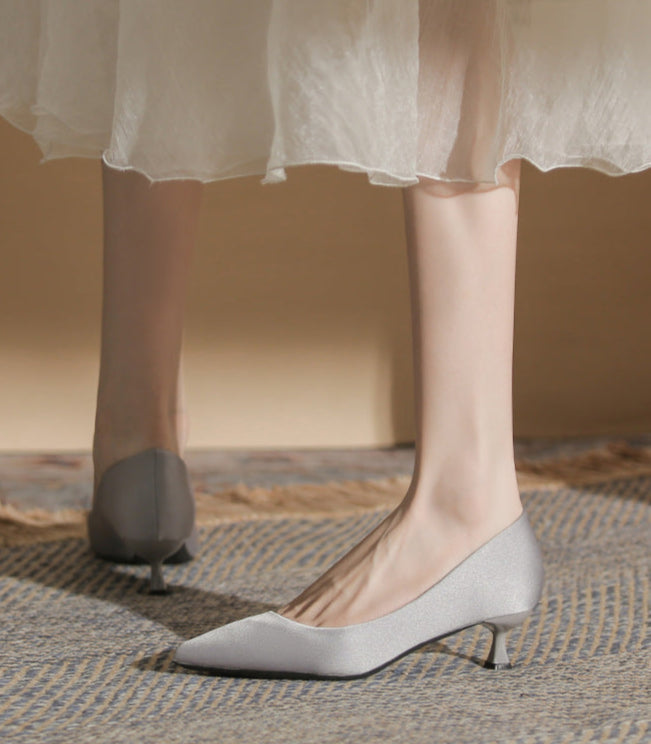 pointed-toe pumps with flared kitten heel – SERENALI