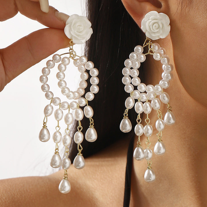 drop earrings with pearls and crystal charms - AMARADO