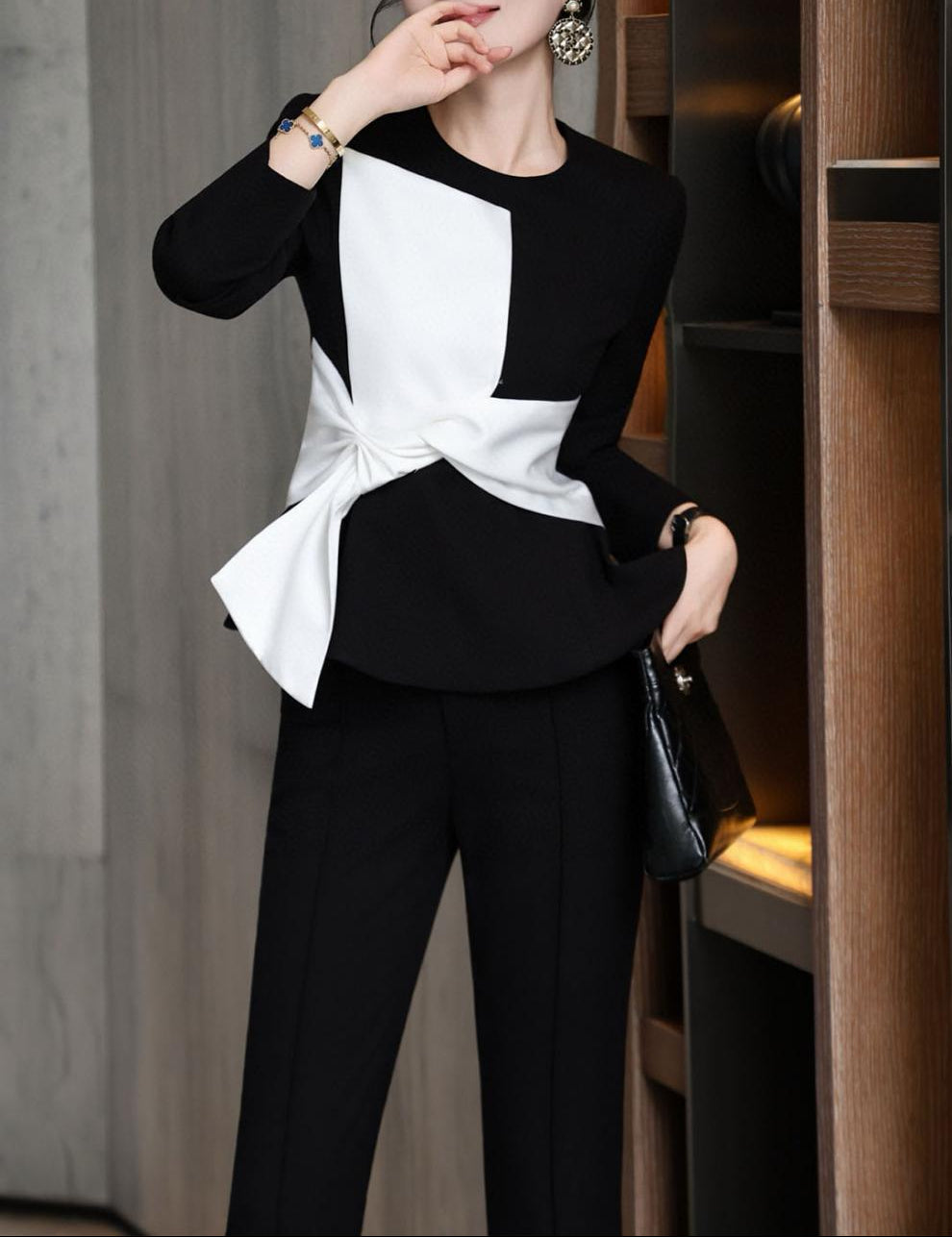 black peplum top with white twist accent & flared pants – AURORA
