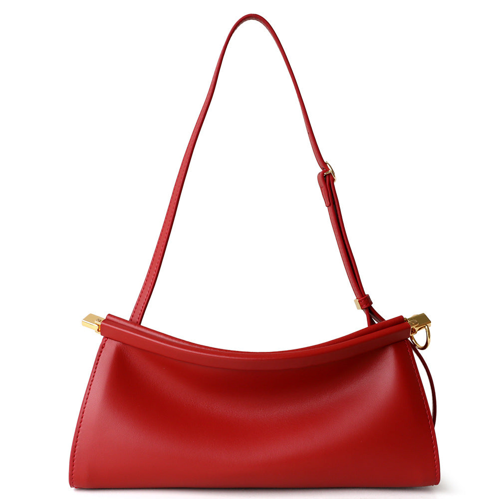 sleek leather shoulder bag with curved silhouette – ZOKSH