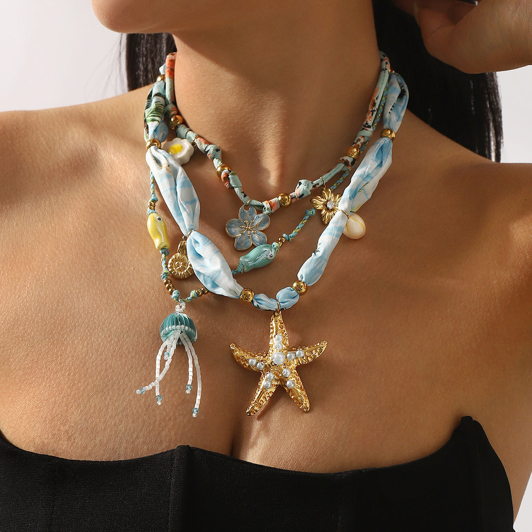 charm pendant necklace with silk and beaded accents – CORALIP