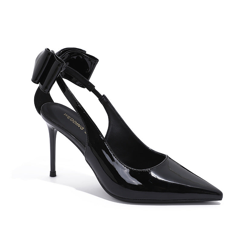 black patent stiletto heels with bow and rhinestone strap – VERA