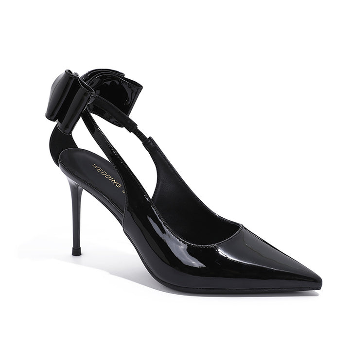 black patent stiletto heels with bow and rhinestone strap – VERA