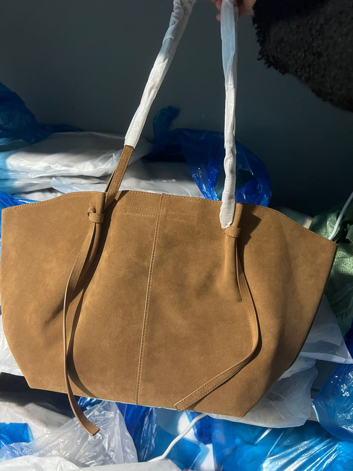 suede winged tote bag with adjustable drawstring straps – SERENA