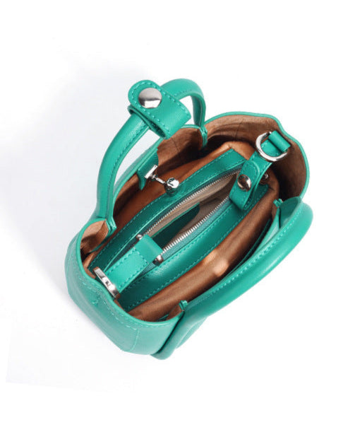 mouwloze uitlopende midi-jurk met kettingriem - CELIAV 