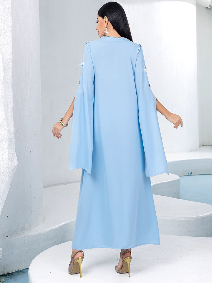 فستان عمودي بأكمام واسعة وتطريزات نجوم - زاراسدو
