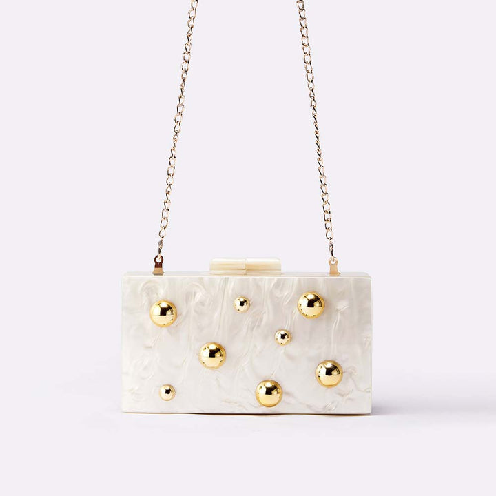 Tortoiseshell box clutch with gold stud accents – BASMA