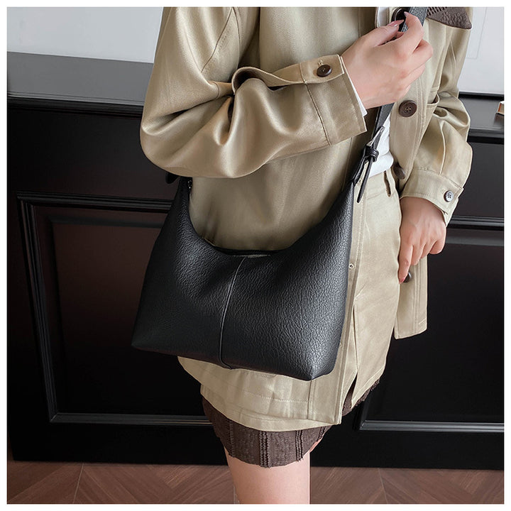 gewebte Rattan-Tragetasche mit doppelten Ledergriffen – LÉONIE 