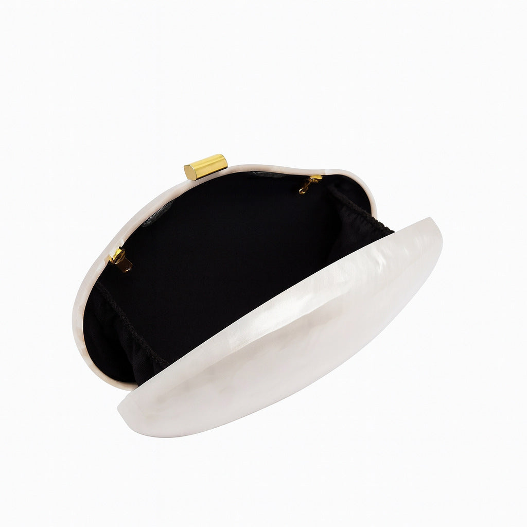 marbled pearl clutch with soft oval silhouette – LUMIÈRE