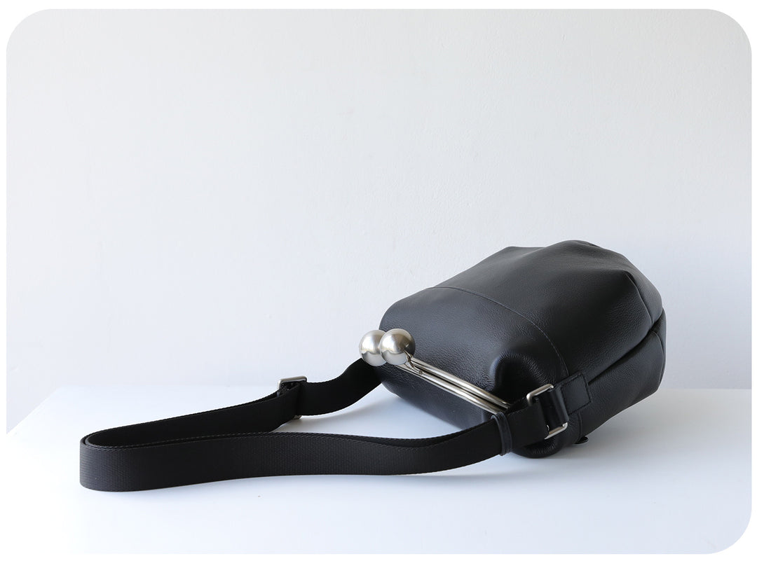 mini leather crossbody bag with metal frame clasp – YOUSF