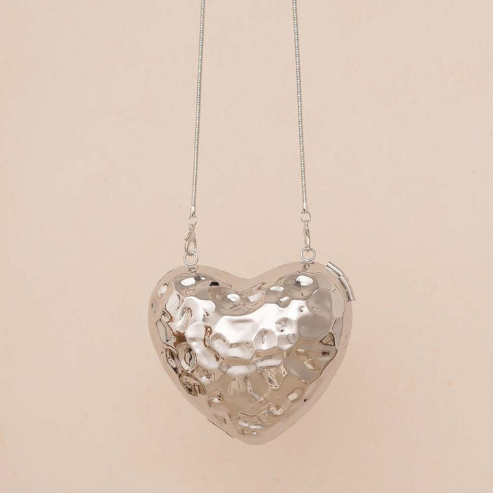 حقيبة كلاتش معدنية على شكل قلب بلمسة نهائية محببة – أموراني