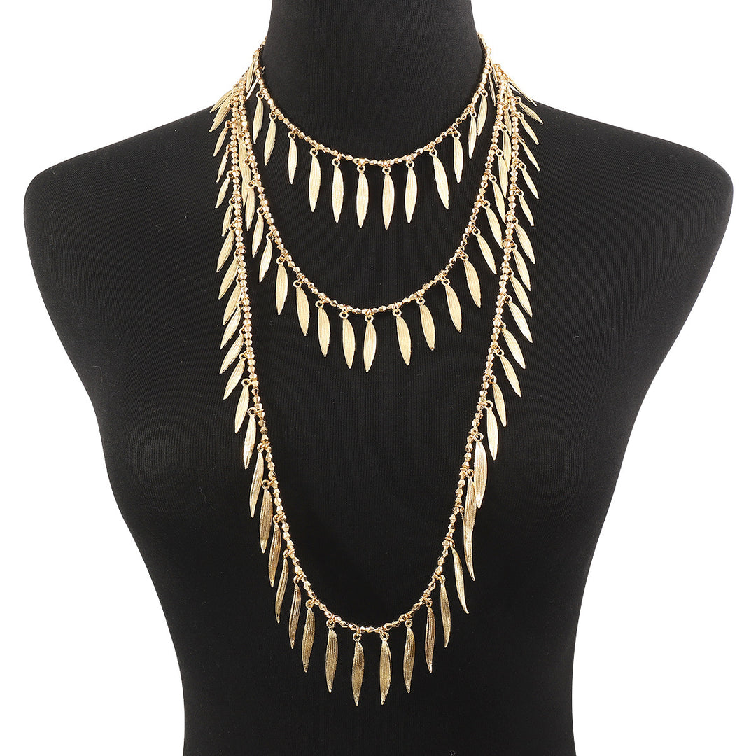 layered leaf pendant necklace with metallic finish – SERENAT