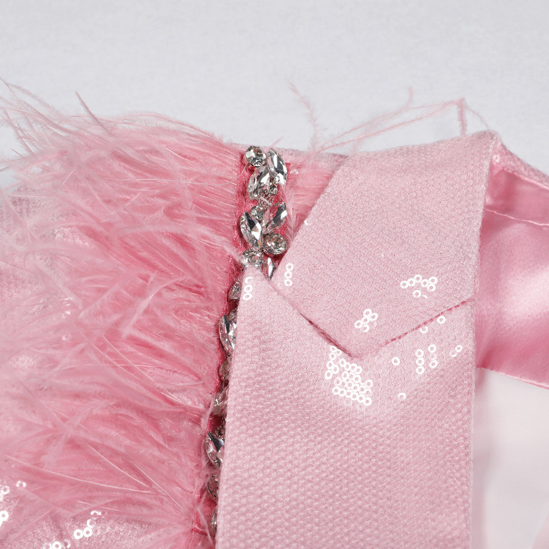 سترة مزدوجة الصدر مزينة بالترتر وحواف من الريش – أوريلكي