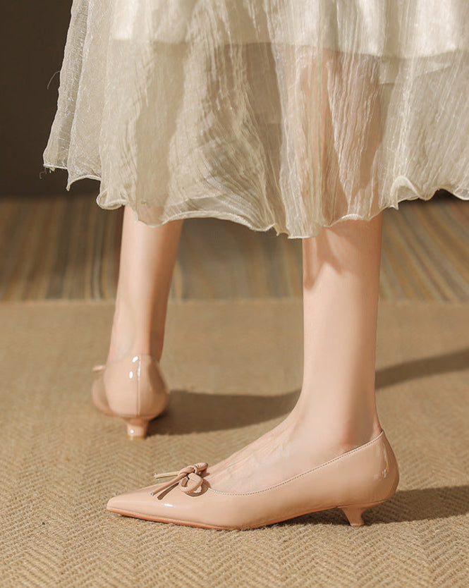 patent pointed-toe pumps with bow detail - AURADLY