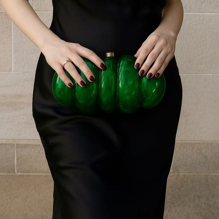 sculpted fuchsia resin clutch with glossy finish – RUBINA