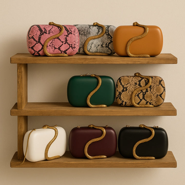 oval clutch with gold snake wrap detail – SERPENTILA