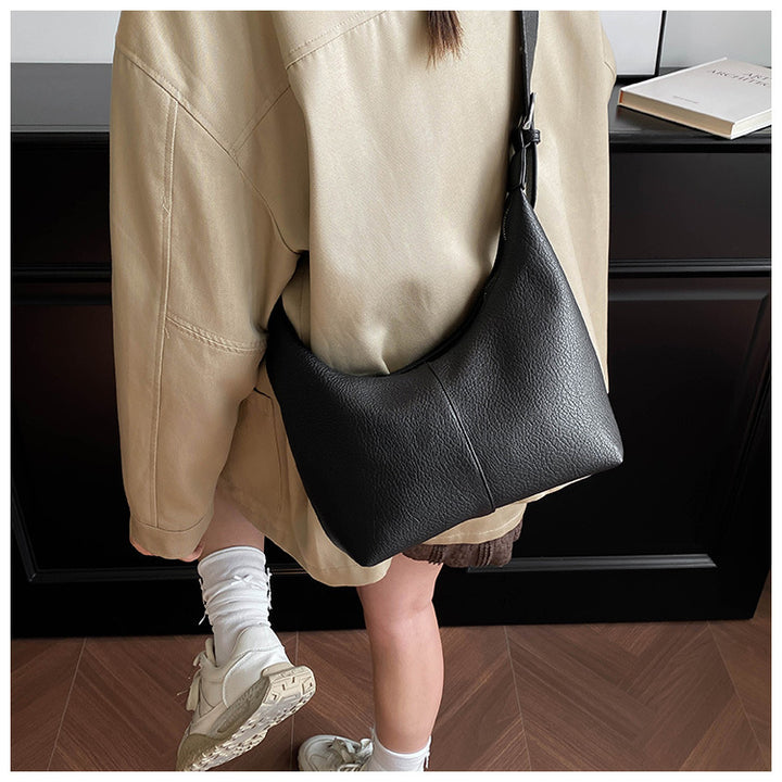 gewebte Rattan-Tragetasche mit doppelten Ledergriffen – LÉONIE 