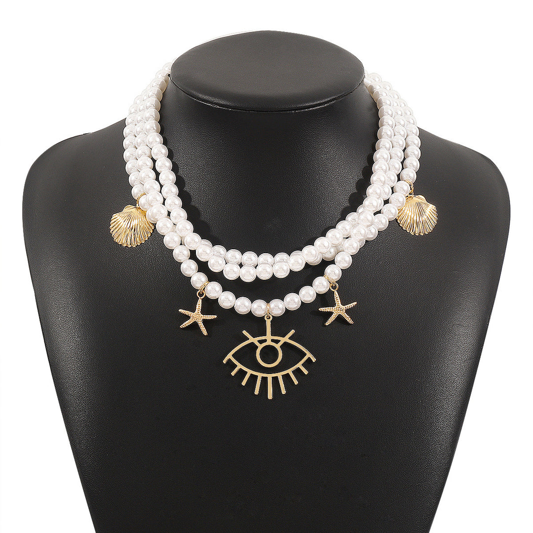 layered pearl necklace with sea charms & statement pendant - SIRENARI