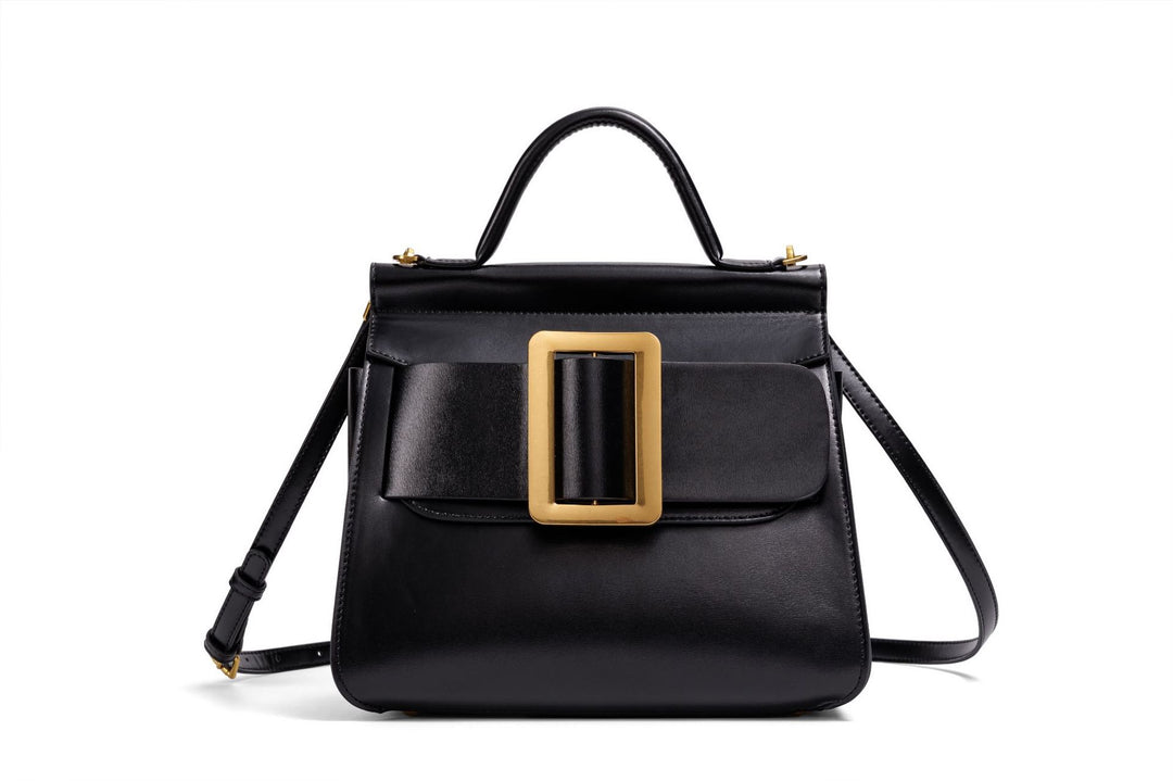 structured leather top-handle bag with oversized buckle – AURIKLA