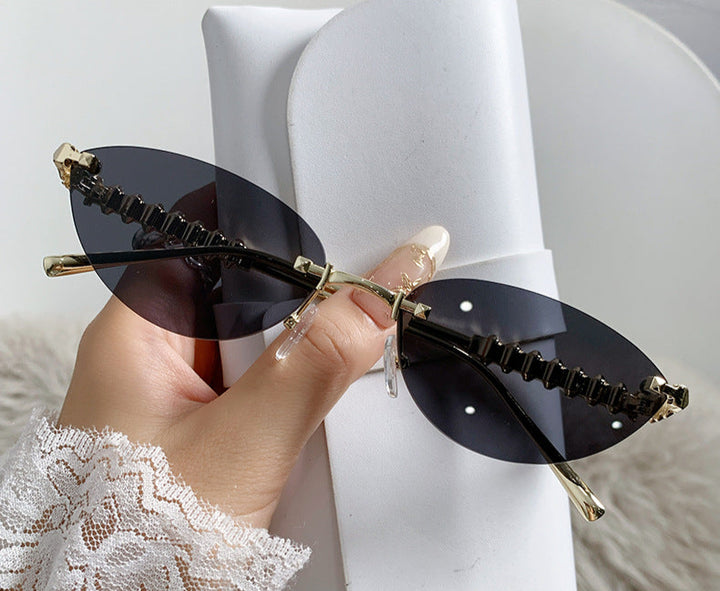 rimless cat-eye sunglasses with gold studded temples – ASTRIDI