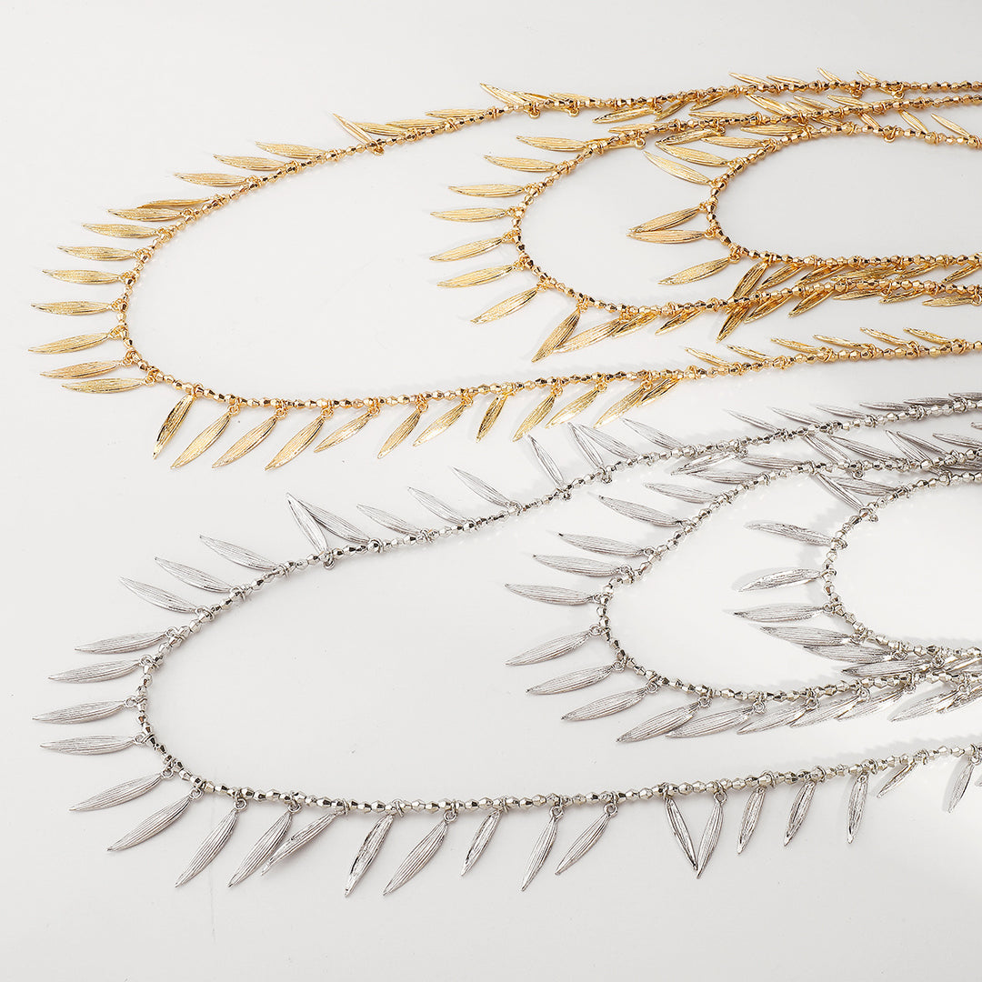 layered leaf pendant necklace with metallic finish – SERENAT