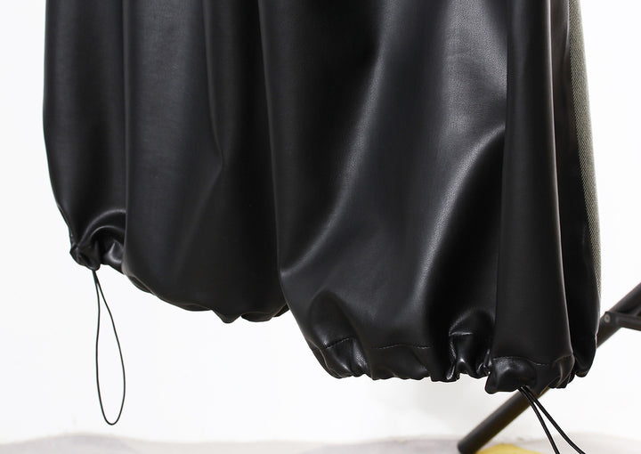 two-tone wide-leg denim pants with faux leather panels – NOIR