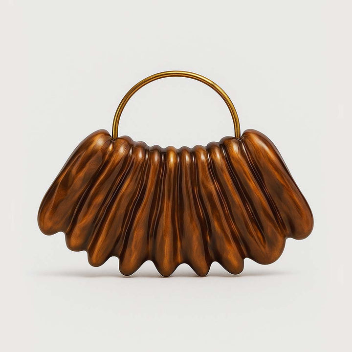 sculpted wave resin clutch with metal handle – AMBRA
