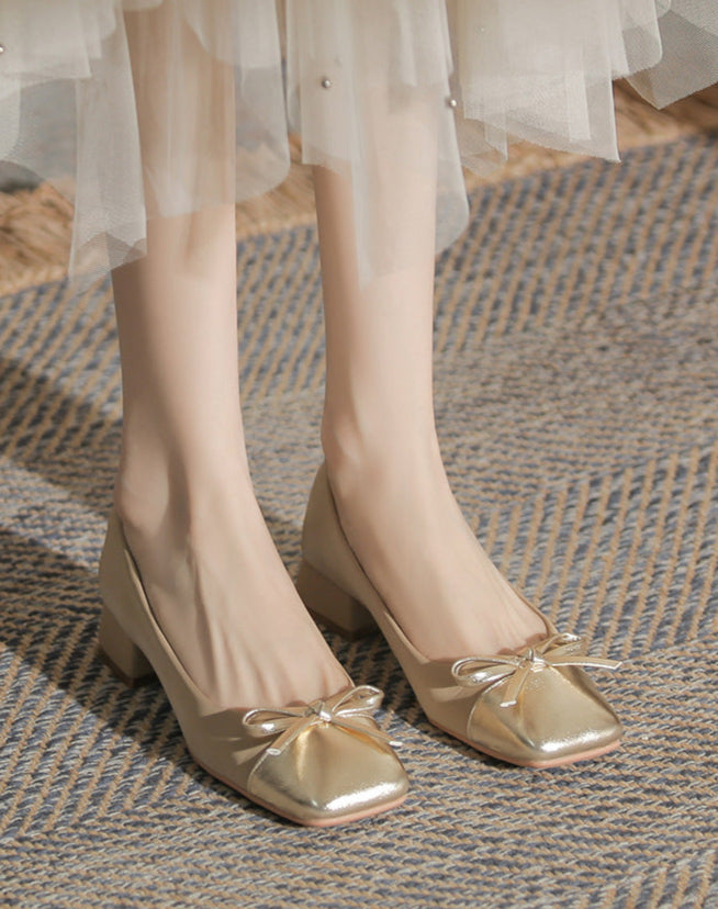 low block heel pumps with metallic bow accent - NORARLO