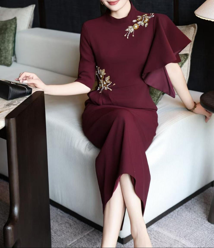 asymmetric sleeve gown with gold floral embellishments – RIVERA