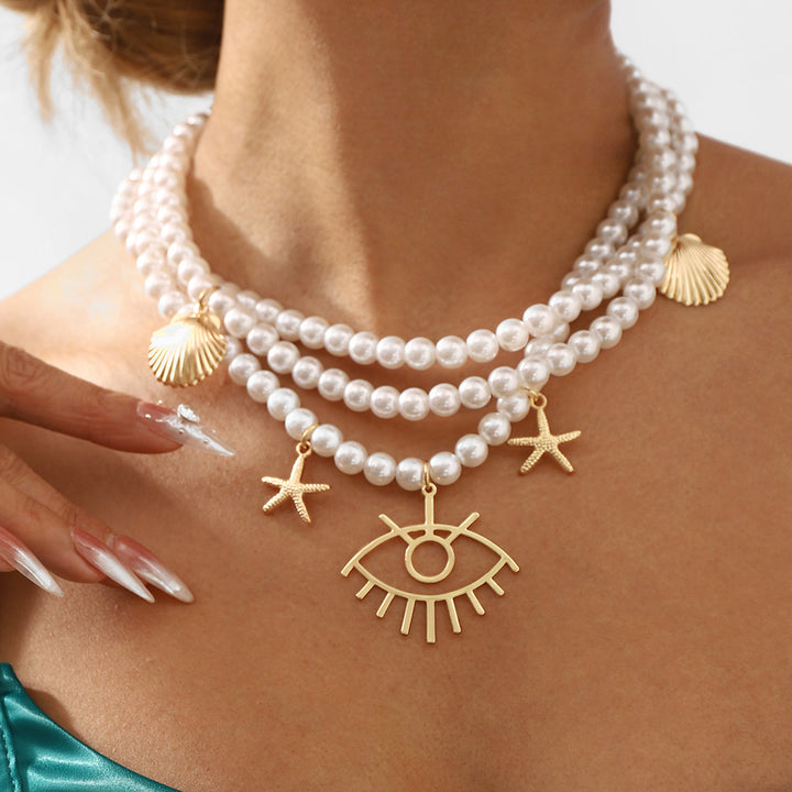 layered pearl necklace with sea charms & statement pendant - SIRENARI