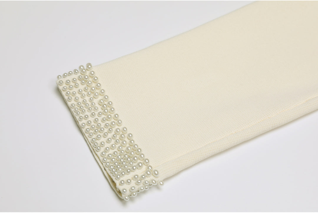 cropped tweed jacket with pearl-embellished pockets – DARAXI